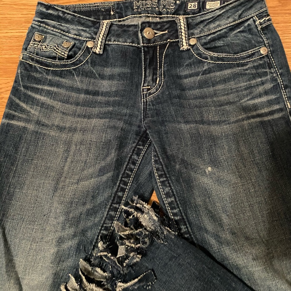 Fringe hem skinny jeans